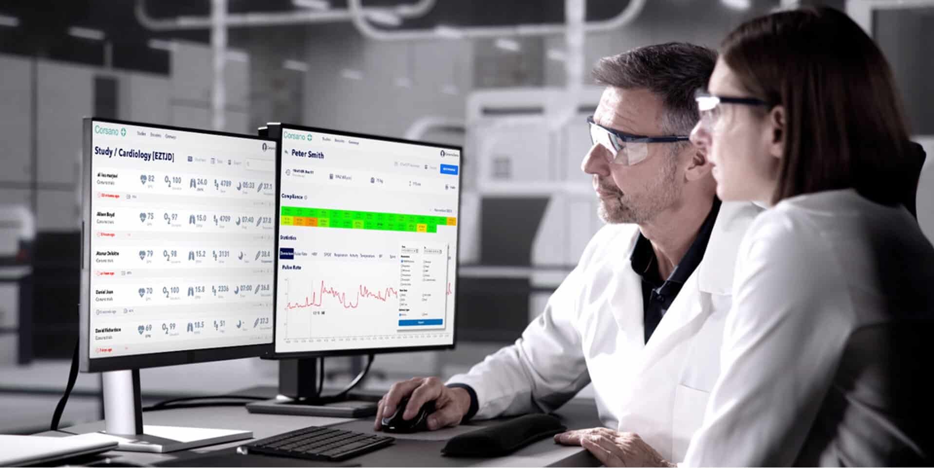Clinical trial research team reviewing continuous biophysical data